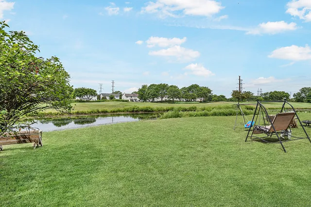 a view of a lake with a big yard