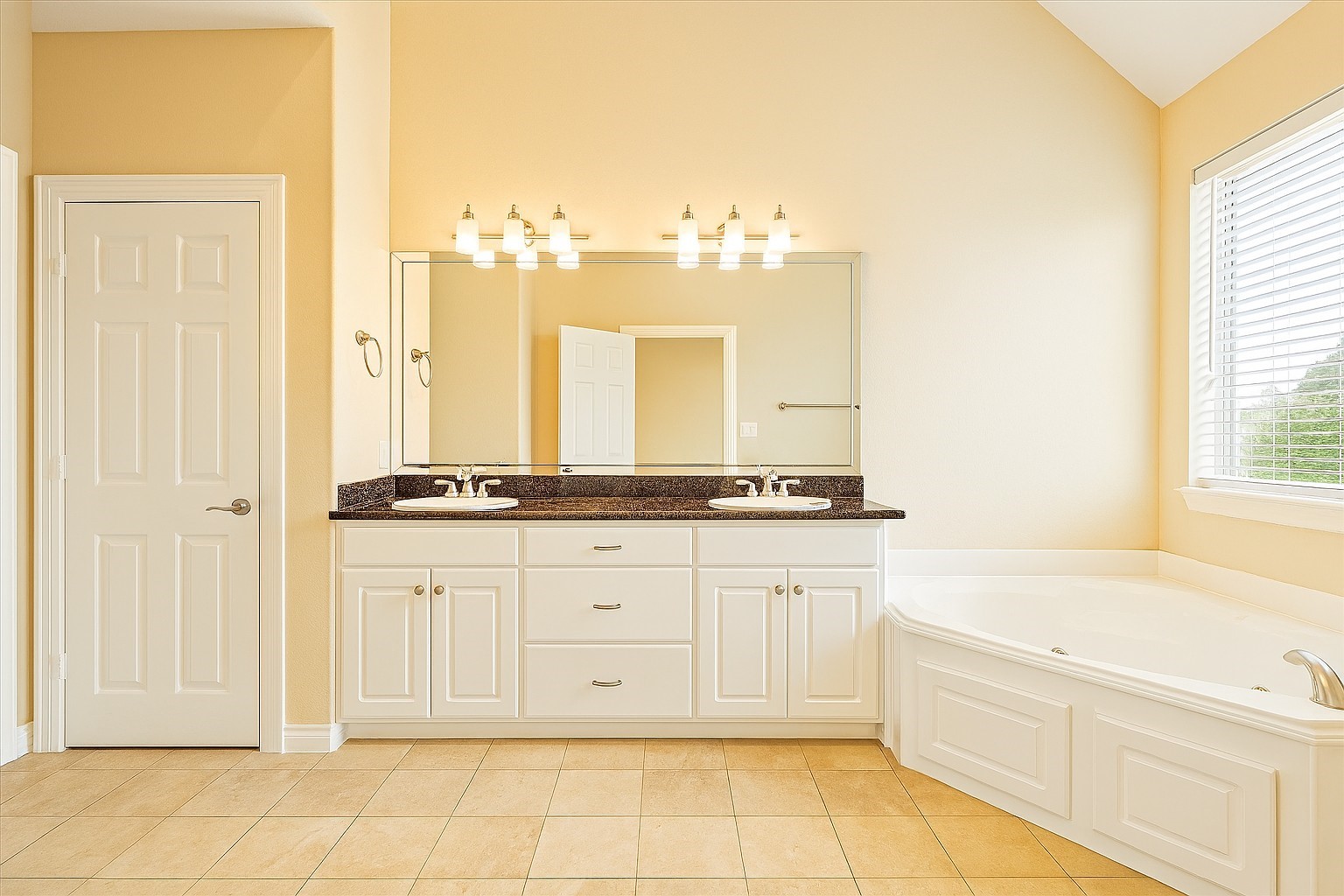 2423 Ralph Street Houston, TX 77006 - Photo 14 of 32 a bathroom with a sink vanity and a mirror