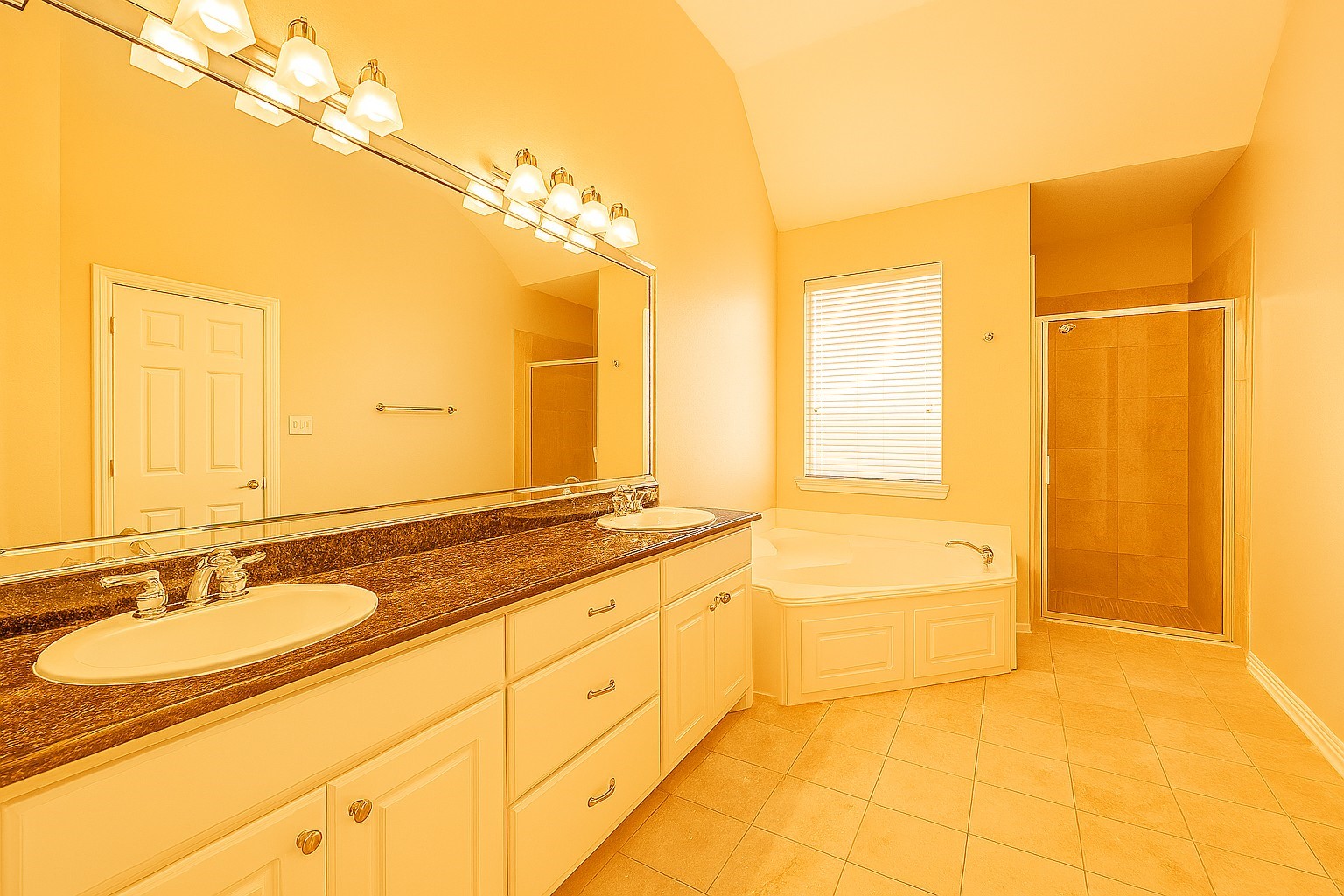 2423 Ralph Street Houston, TX 77006 - Photo 20 of 32 a bathroom with a granite countertop sink and a mirror