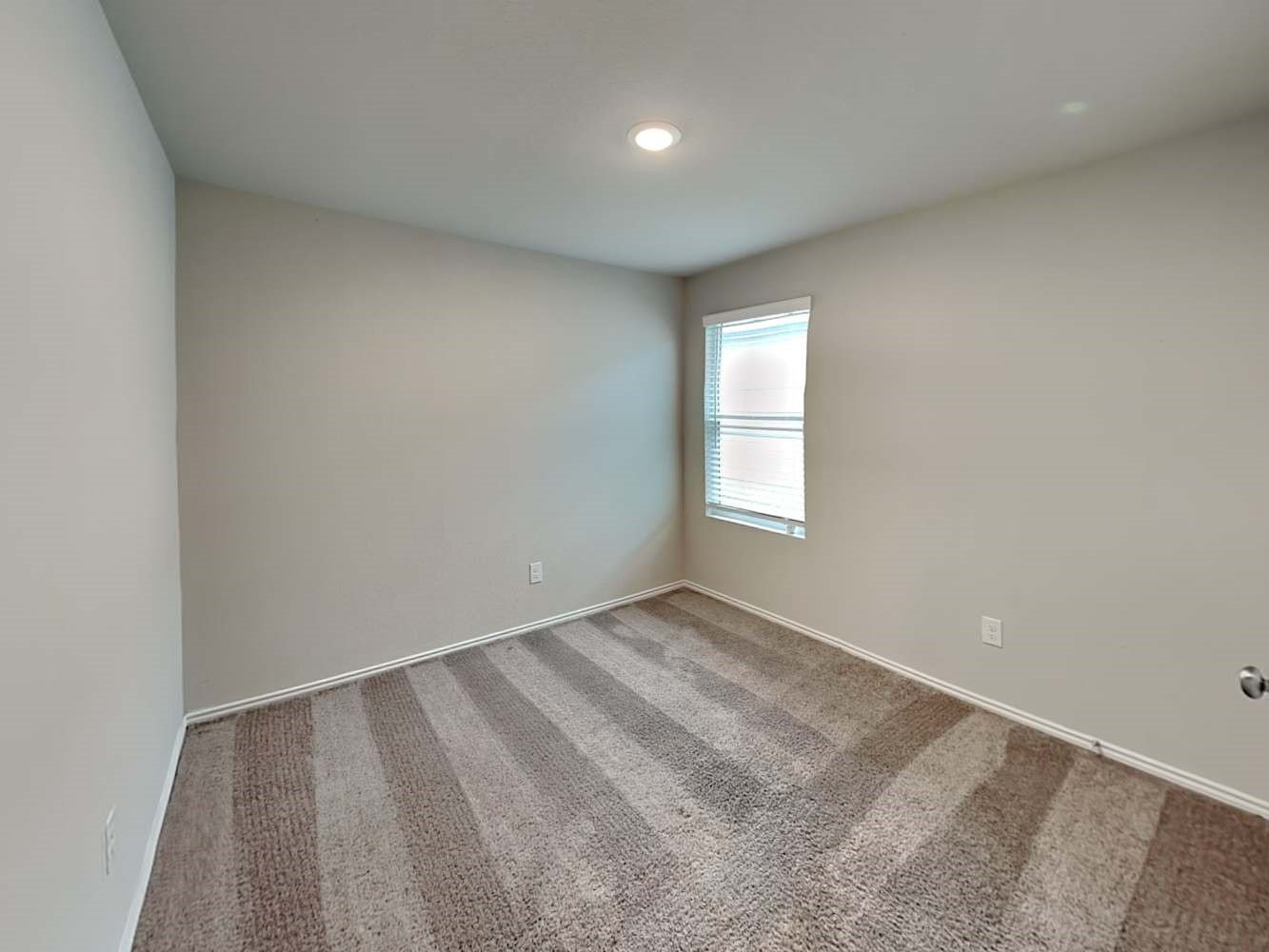 7322 Adaja River San Antonio, TX 78244 - Photo 12 of 17 an empty room with a window