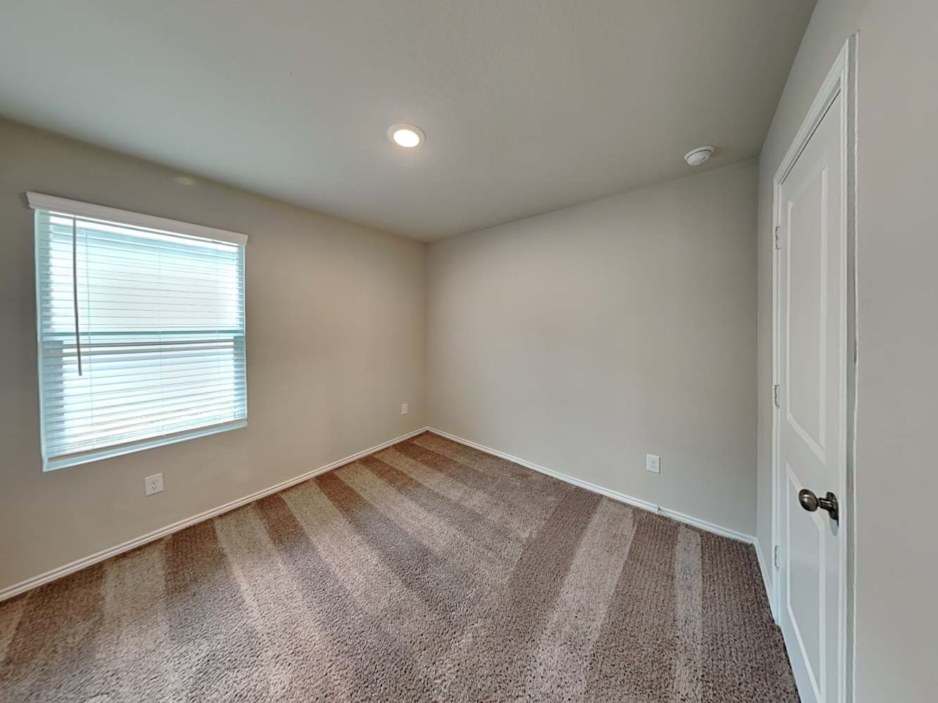 7322 Adaja River San Antonio, TX 78244 - Photo 13 of 17 an empty room with a window