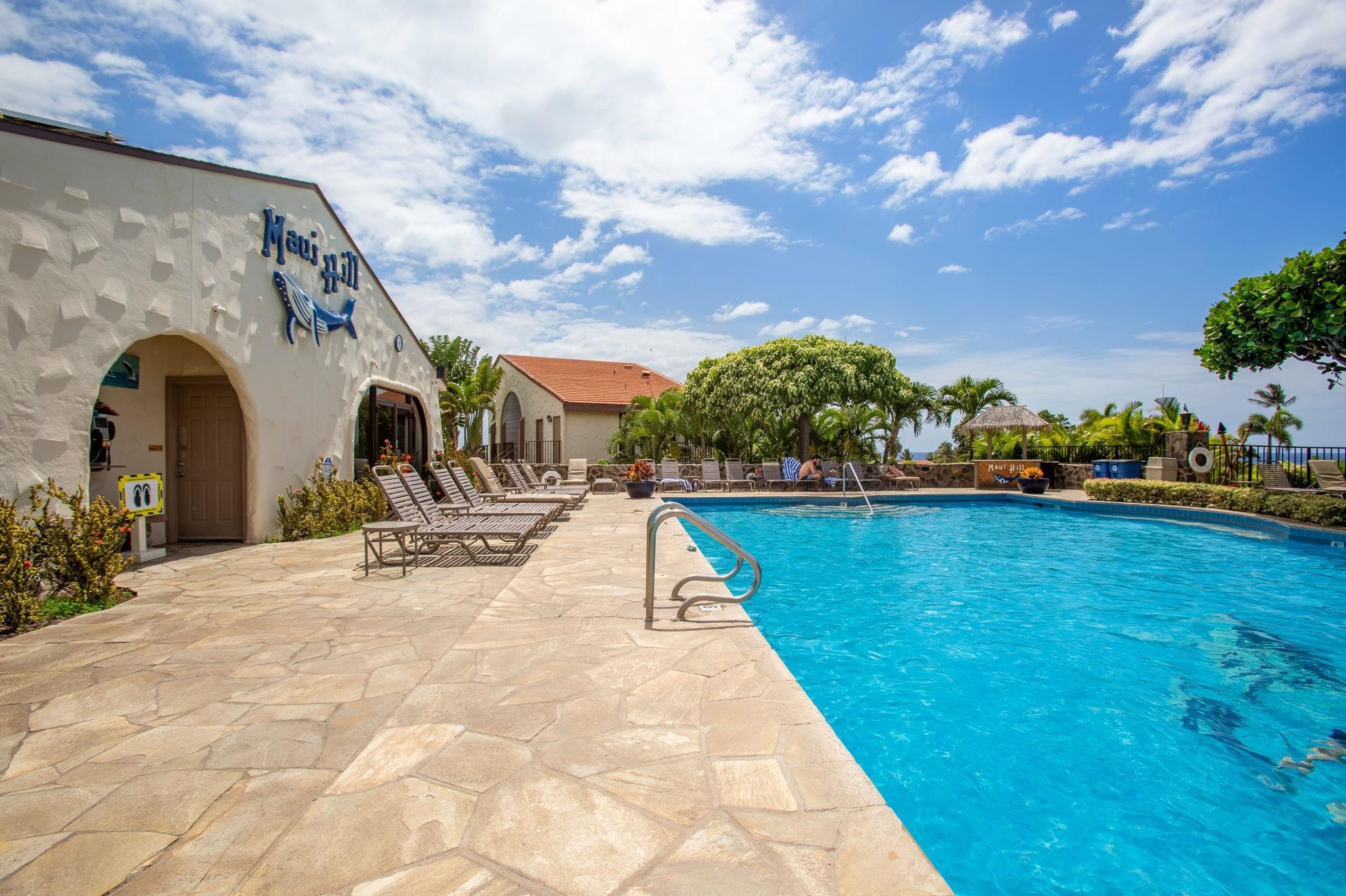 2881 South Kihei Road, Unit 59 Kihei, HI 96753 - Photo 36 of 37 a view of swimming pool with a bench in the background