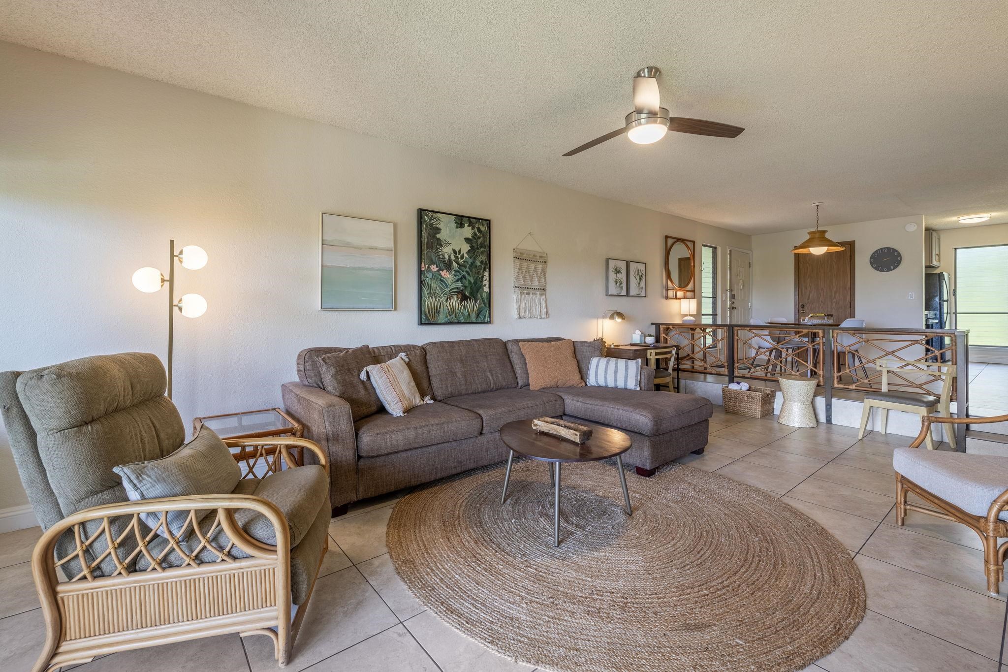 2881 South Kihei Road, Unit 59 Kihei, HI 96753 - Photo 5 of 37 a living room with furniture and wooden floor