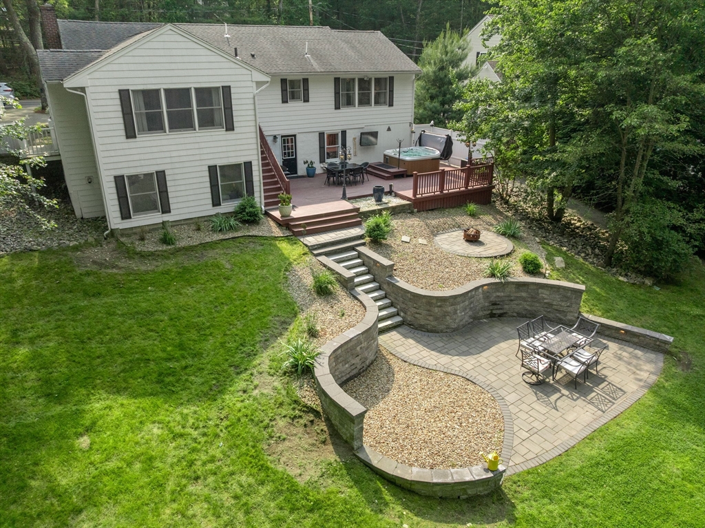 175 Central Street North Reading, MA 01864 - Photo 40 of 42 front view of a house with swimming pool and sitting area