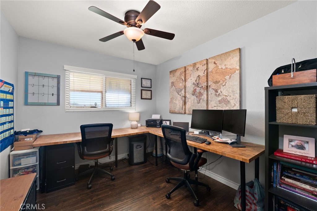 18165 Mariposa Avenue Riverside, CA 92508 - Photo 18 of 59 a view of a workspace with furniture and a window