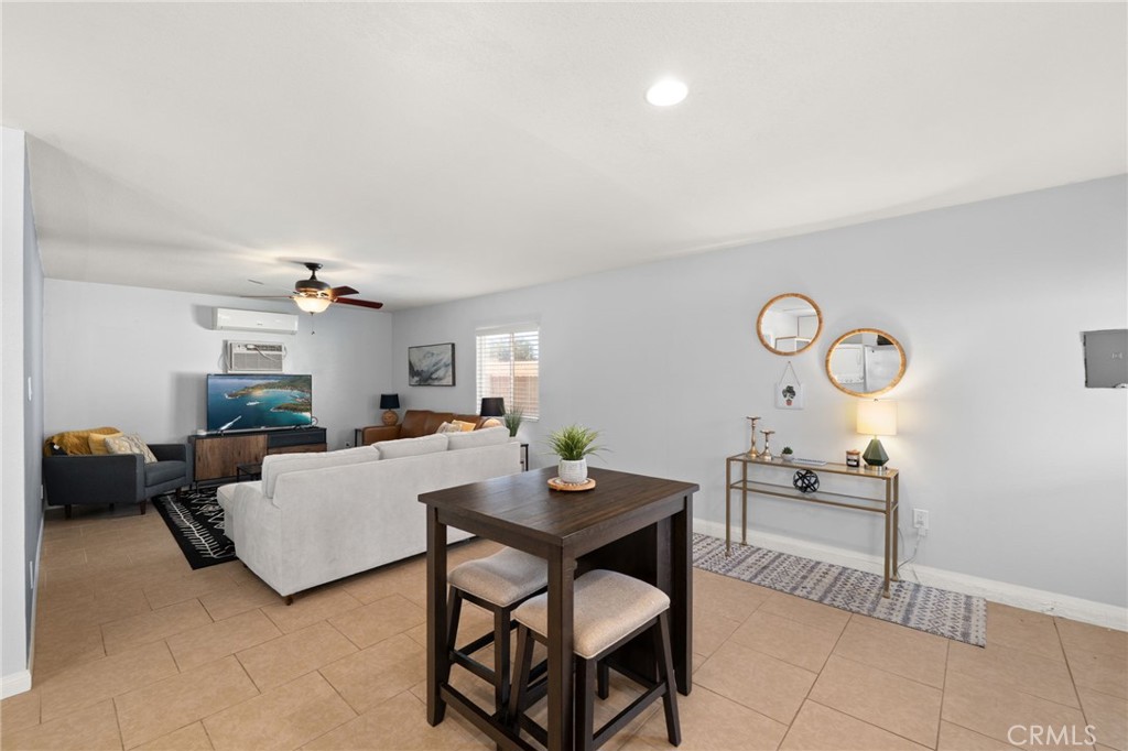 18165 Mariposa Avenue Riverside, CA 92508 - Photo 39 of 59 a living room with furniture and a table