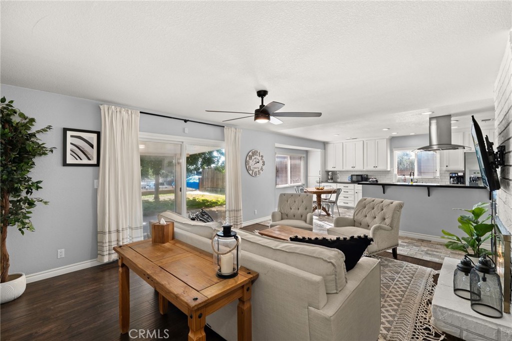 18165 Mariposa Avenue Riverside, CA 92508 - Photo 7 of 59 a living room with furniture and a large window