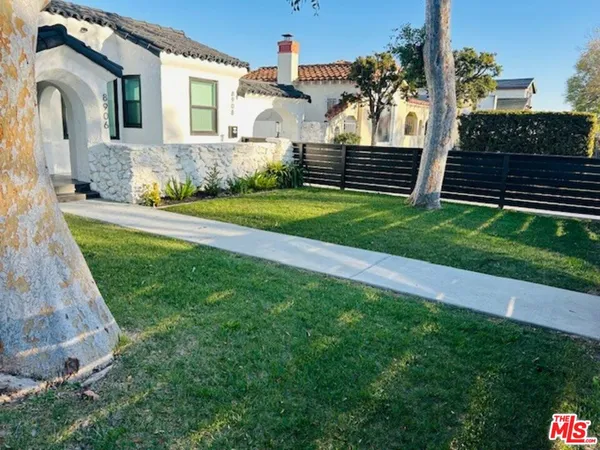 a front view of house with yard