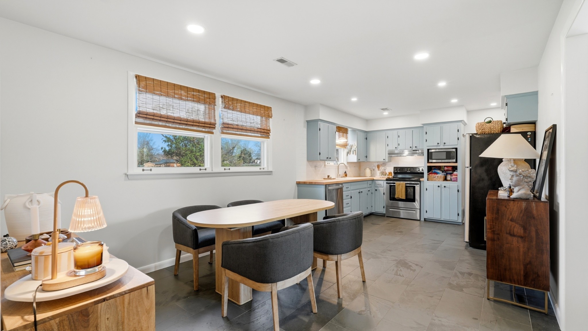 7524 Gary Road Joelton, TN 37080 - Photo 12 of 39 a dining room with furniture and a window