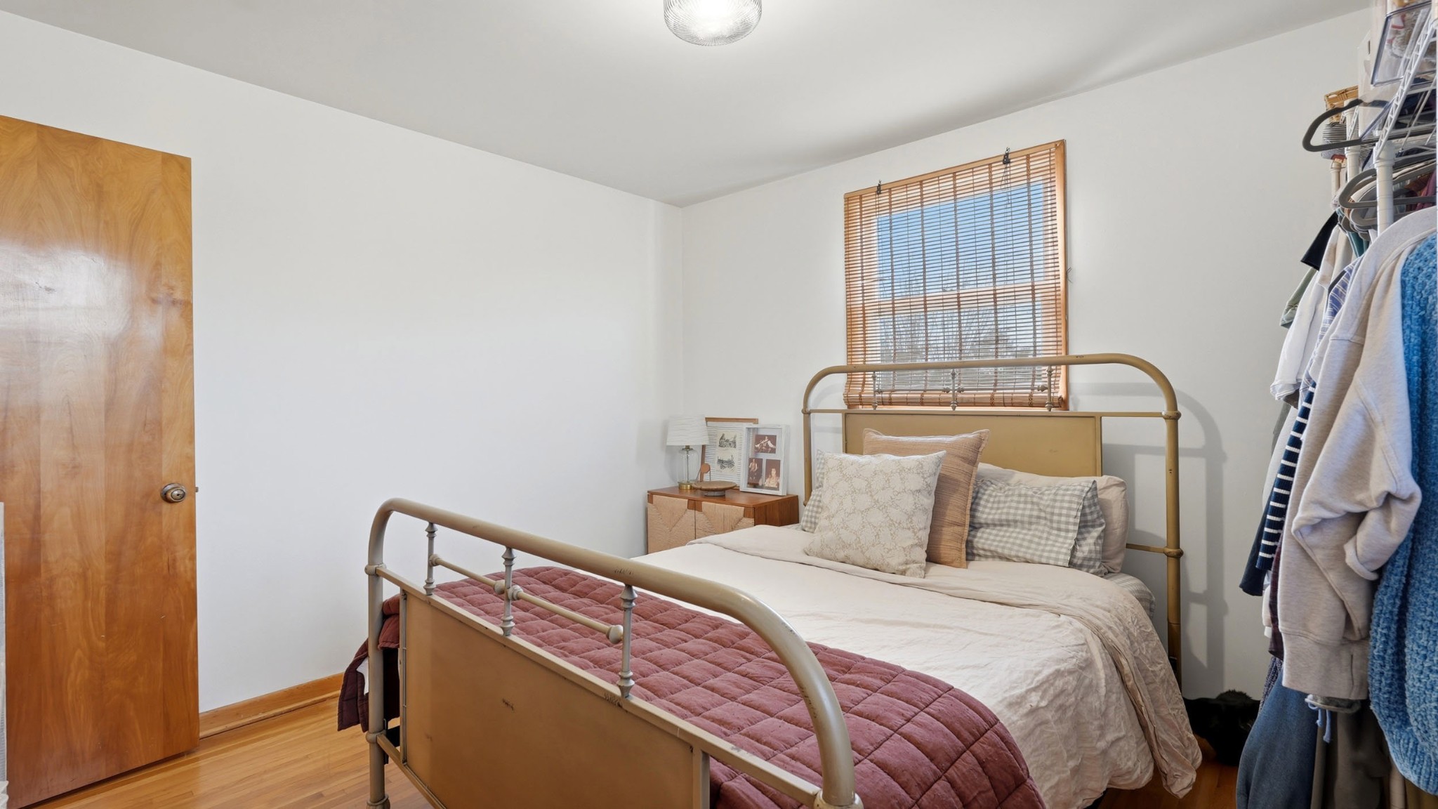 7524 Gary Road Joelton, TN 37080 - Photo 19 of 39 a bedroom with a bed and wooden floor