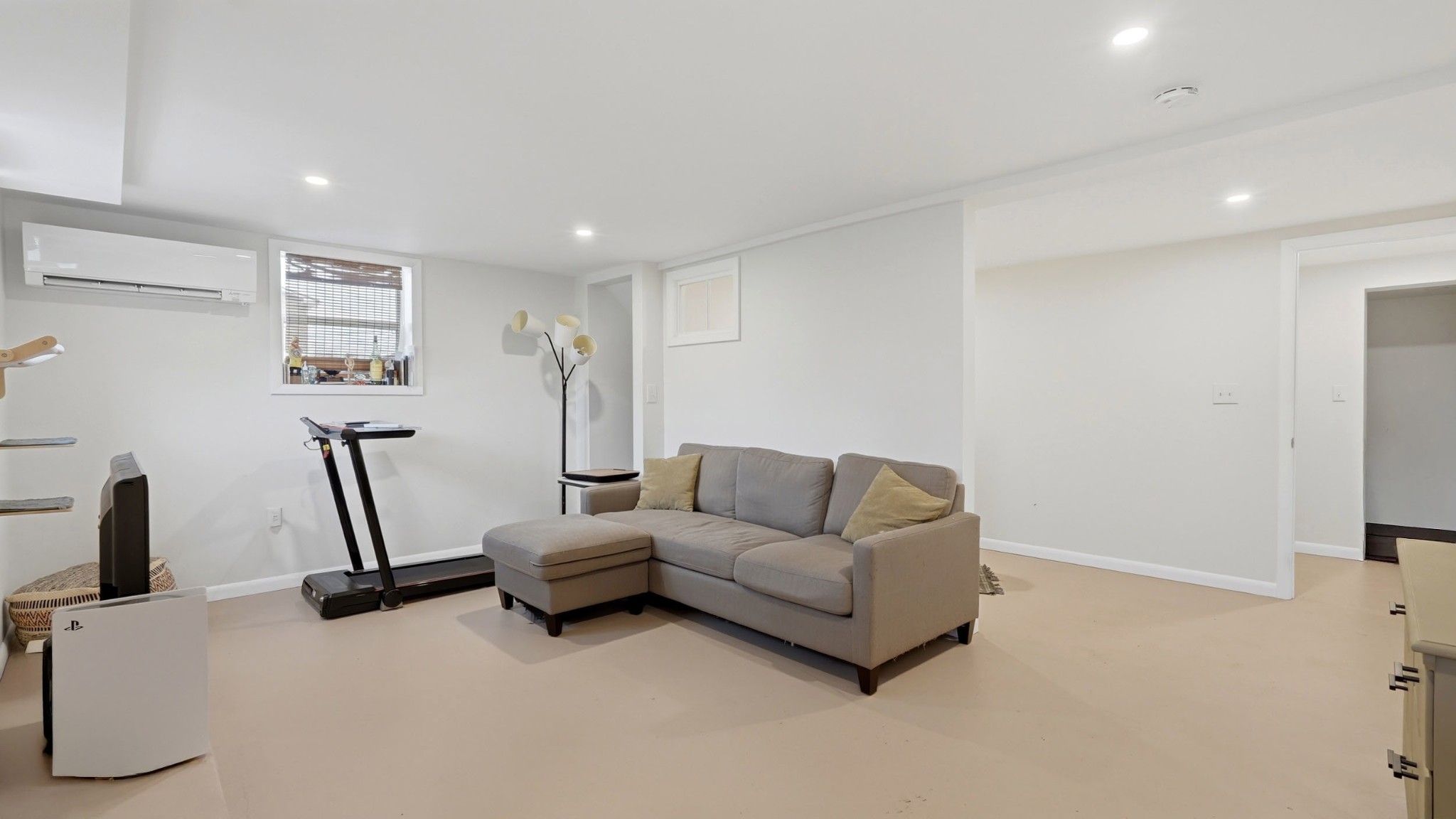 7524 Gary Road Joelton, TN 37080 - Photo 20 of 39 a living room with furniture gym equipment and a flat screen tv