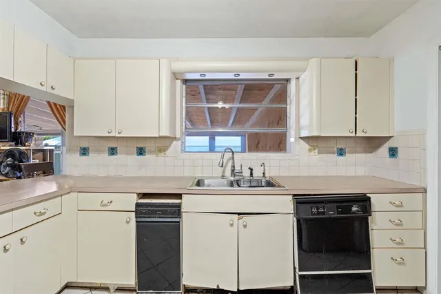 a glass door with a shower