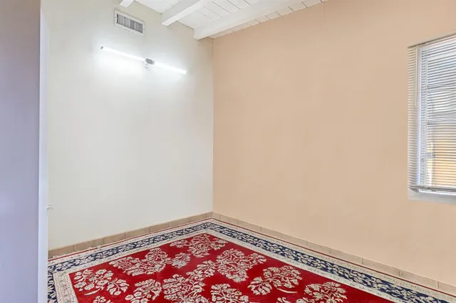 a kitchen with stainless steel appliances a refrigerator sink and microwave