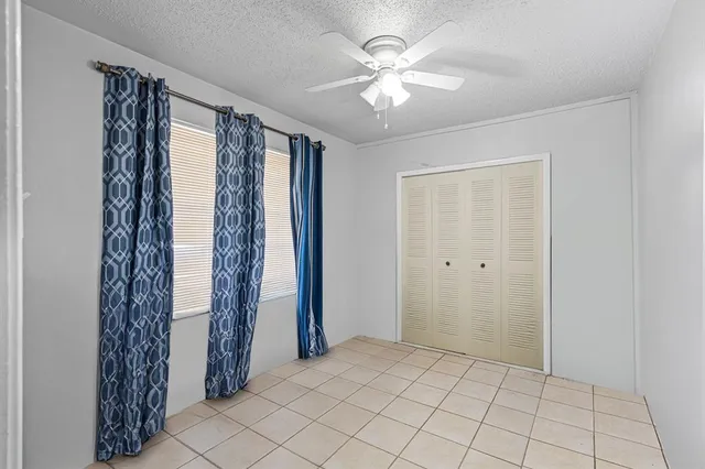 a view of backyard with small cabin