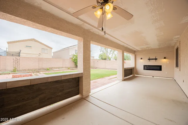 a view of a kitchen with a sink and a stove top oven