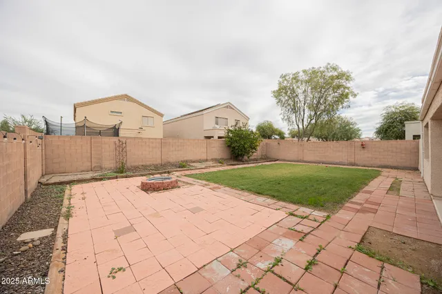 a front view of a house with yard