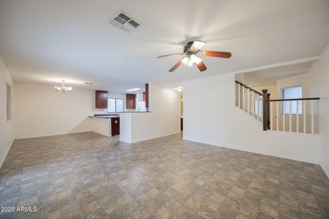 a view of entryway and kitchen