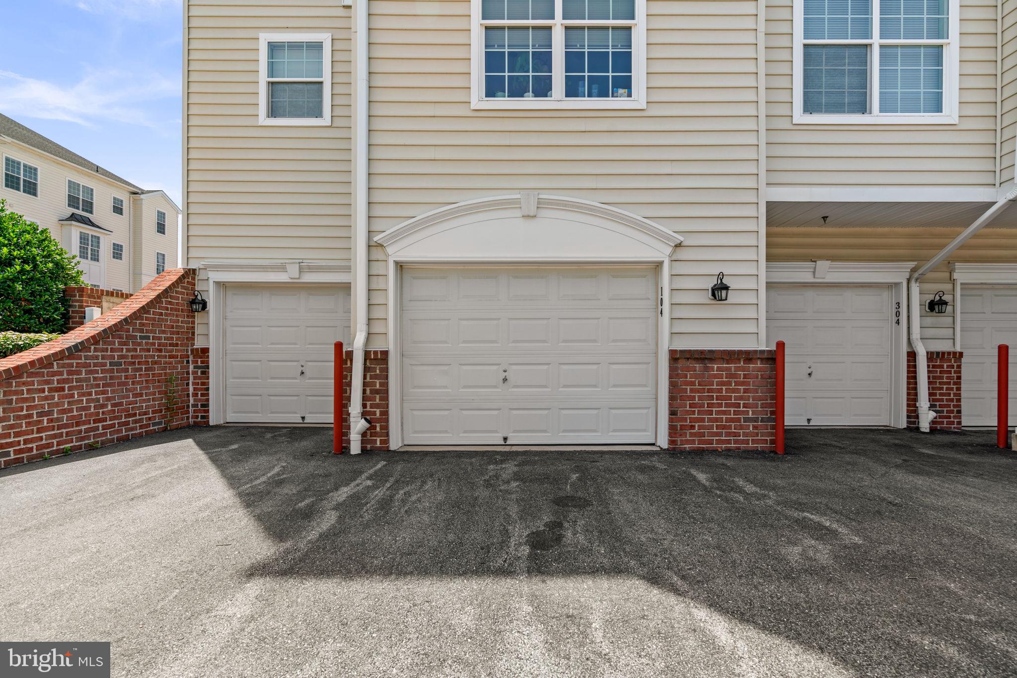 7315 Maplecrest Road, Unit 104 Elkridge, MD 21075 - Photo 43 of 58 a view of a house with garage