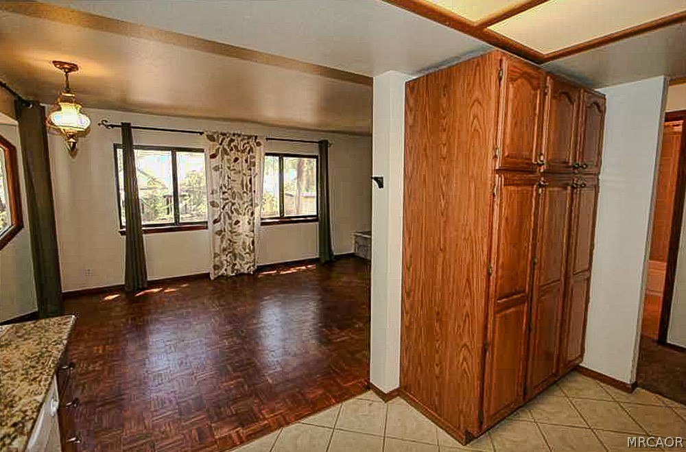 337 Maple Lane Sugarloaf, CA 92386 - Photo 6 of 25 wooden floor and windows in a room