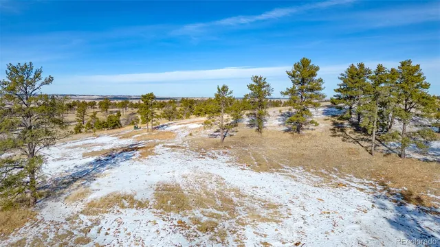 a view of a beach with a ocean view