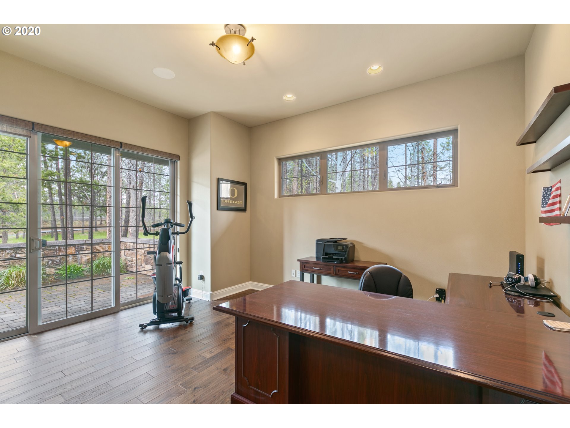 16767 Stage Stop Drive Bend, OR 97707 - Photo 17 of 26 a view of a workspace with furniture and a window
