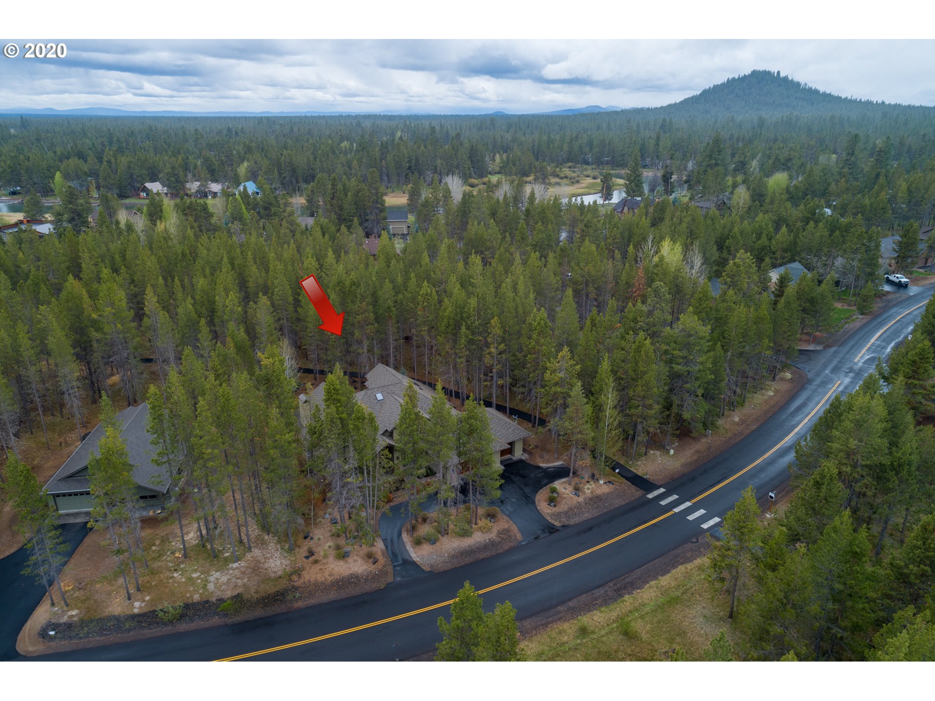 16767 Stage Stop Drive Bend, OR 97707 - Photo 26 of 26 a view of a lake with a mountain