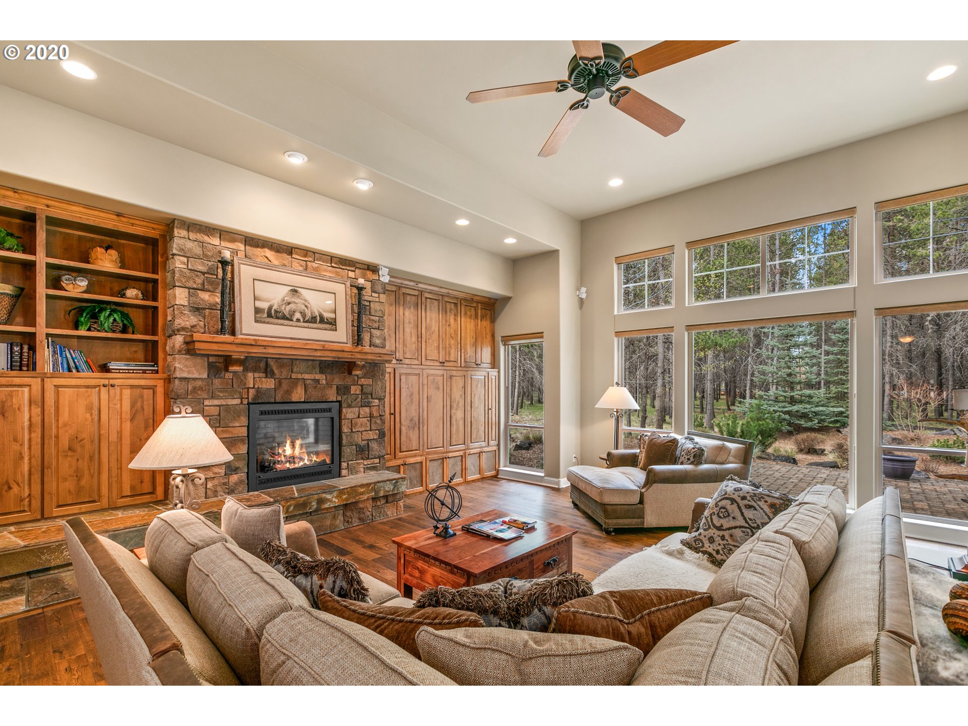 16767 Stage Stop Drive Bend, OR 97707 - Photo 5 of 26 a living room with furniture fireplace and a large window