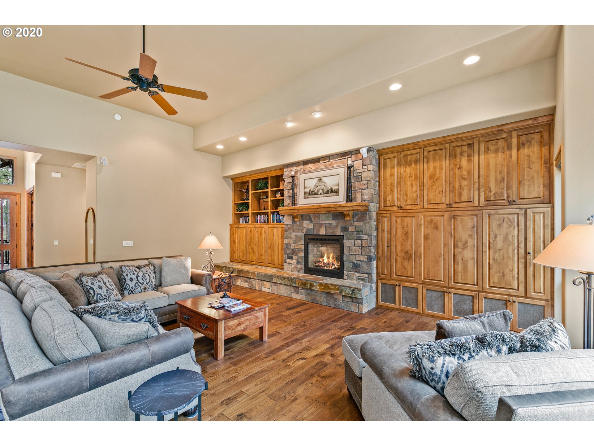 16767 Stage Stop Drive Bend, OR 97707 - Photo 6 of 26 a living room with furniture and a fireplace