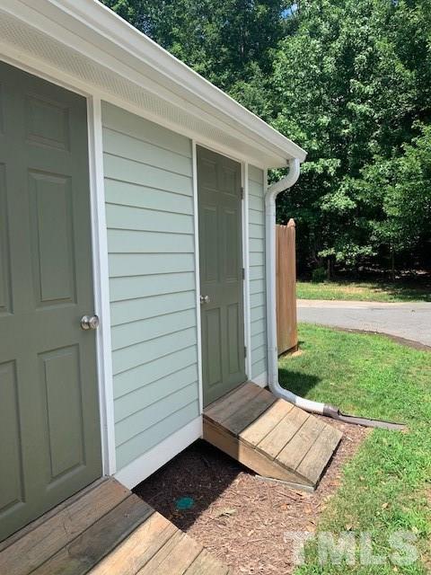 4600 All Points View Way Raleigh, NC 27614 - Photo 22 of 27 Custom storage shed with double entry seamlessly connects to the detached two-car garage. So well planned, you won't believe it wasn't original to the property!