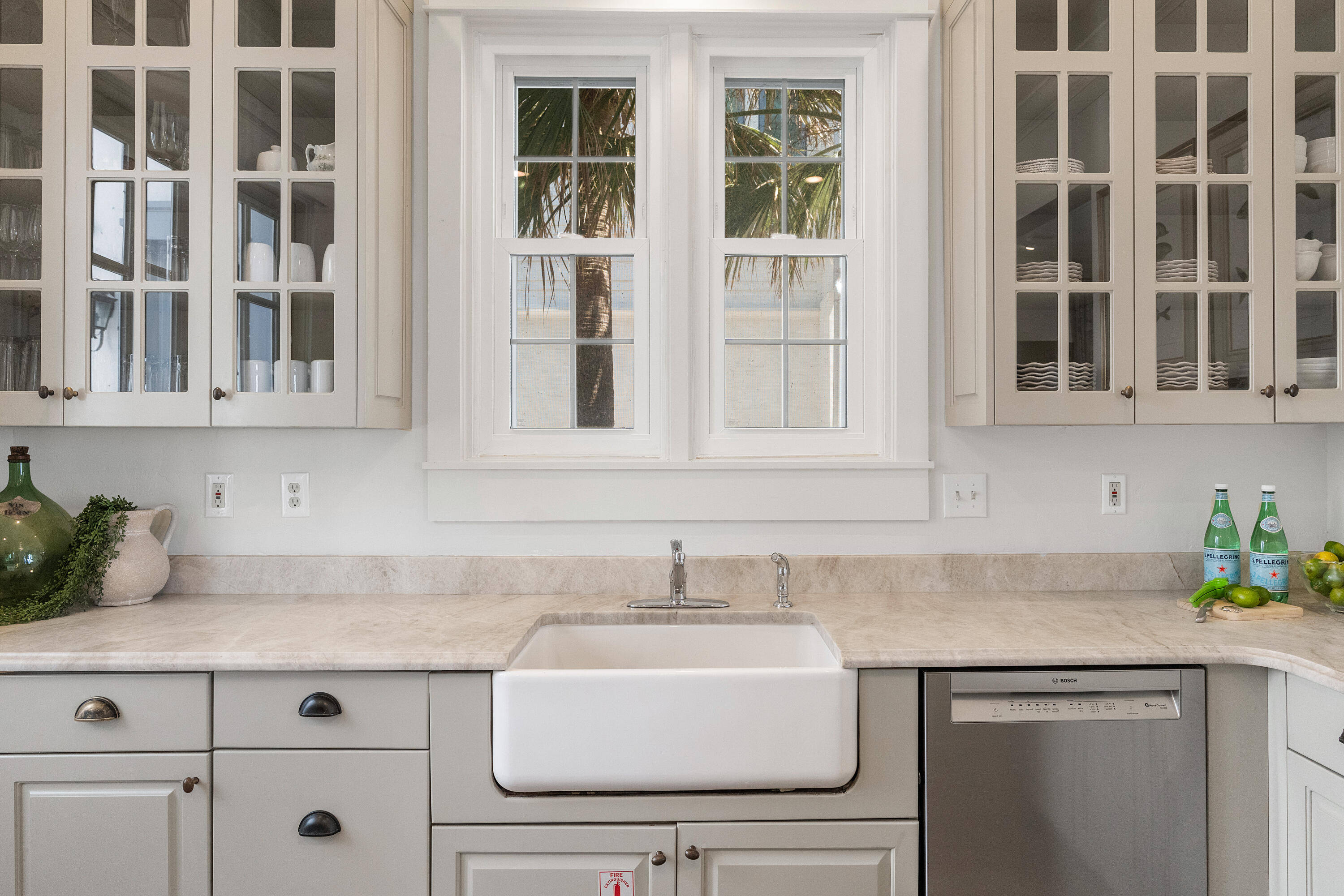 517 Eastern Lake Road Santa Rosa Beach, FL 32459 - Photo 32 of 53 a kitchen with stainless steel appliances granite countertop white cabinets and a sink