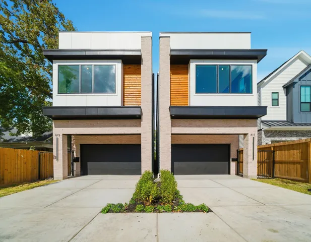 a front view of a house with yard