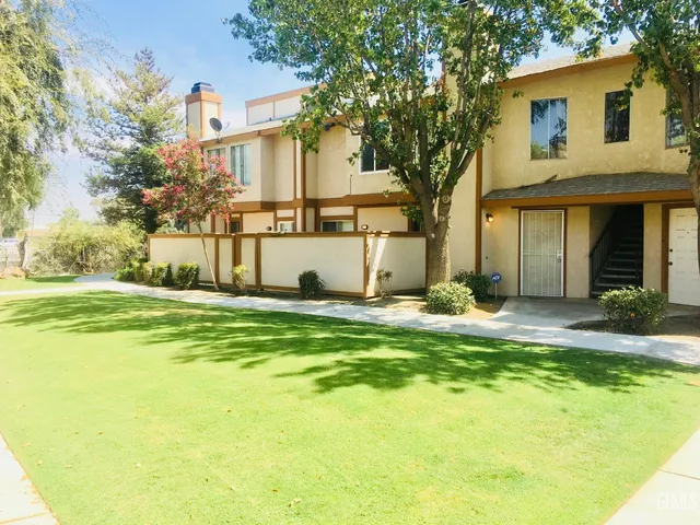a view of a house with a swimming pool