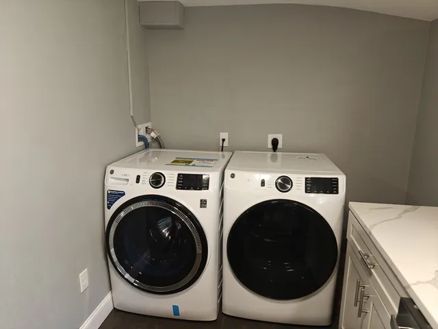 a utility room with dryer and washer
