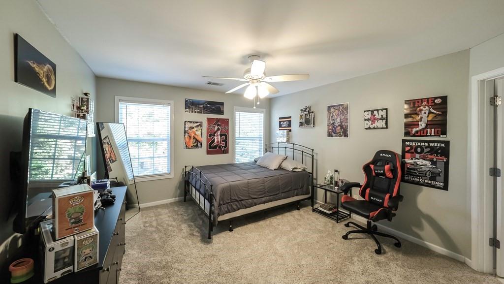 8680 Copperridge Drive Winston, GA 30187 - Photo 14 of 58 a bedroom with bed and a window