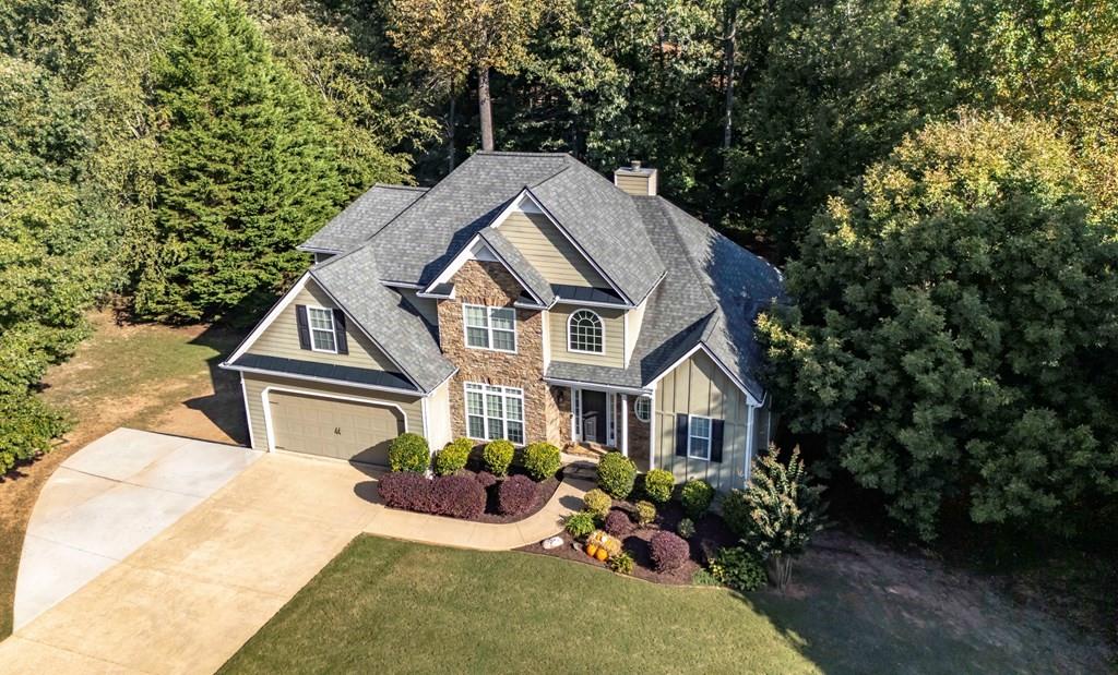 8680 Copperridge Drive Winston, GA 30187 - Photo 2 of 58 a view of a house with roof deck and garden