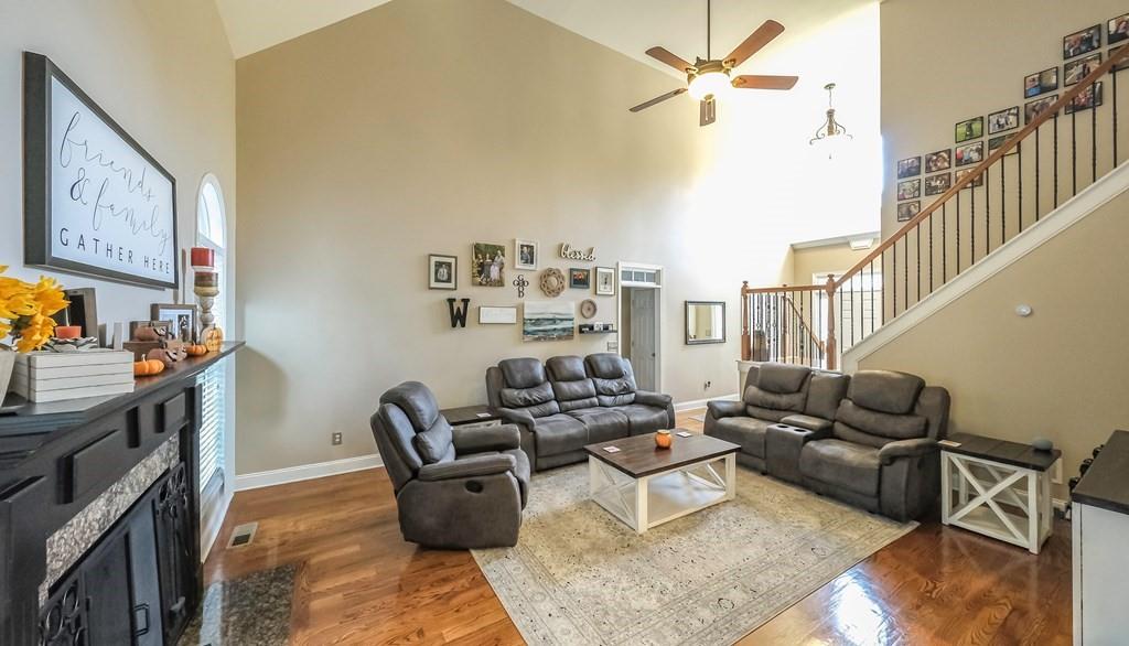 8680 Copperridge Drive Winston, GA 30187 - Photo 32 of 58 a living room with furniture or couch and a chandelier