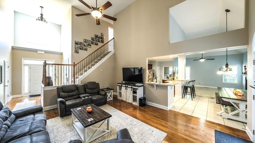 8680 Copperridge Drive Winston, GA 30187 - Photo 33 of 58 a living room with furniture and wooden floor