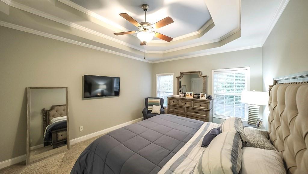 8680 Copperridge Drive Winston, GA 30187 - Photo 44 of 58 a bedroom with a bed and a television