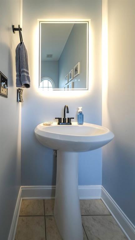 8680 Copperridge Drive Winston, GA 30187 - Photo 51 of 58 a bathroom with a sink and a mirror