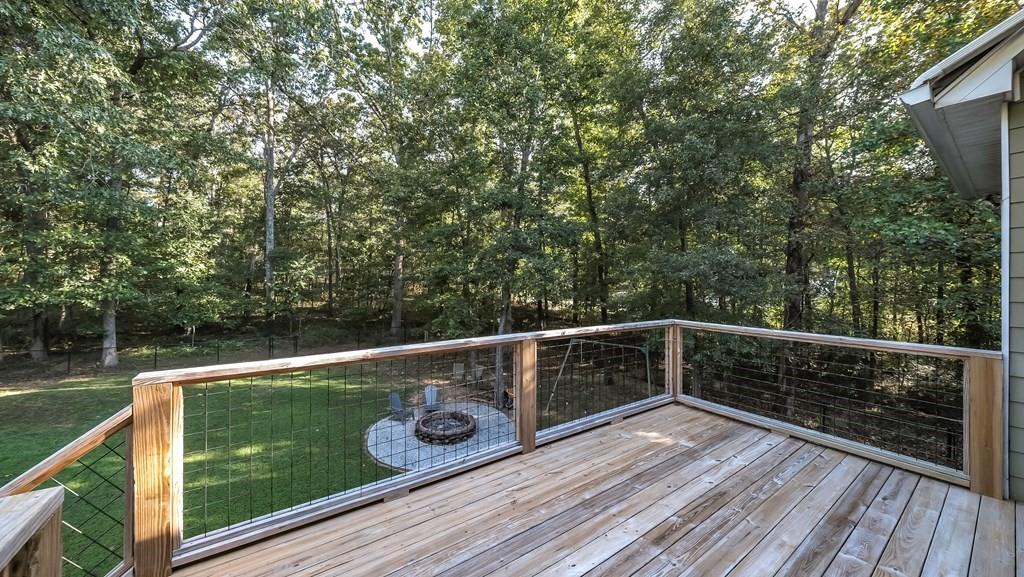 8680 Copperridge Drive Winston, GA 30187 - Photo 52 of 58 a view of a balcony with wooden floor