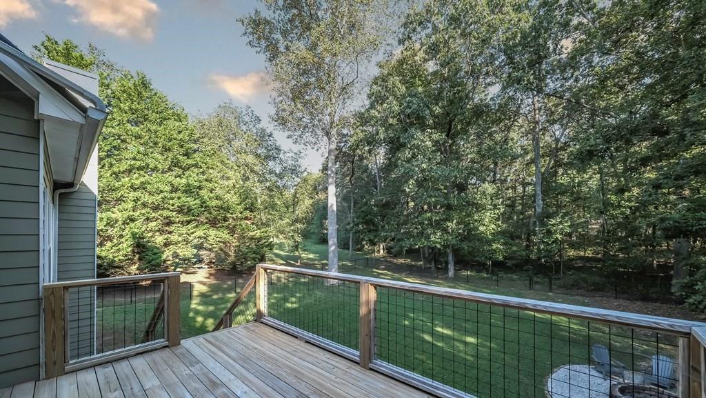 8680 Copperridge Drive Winston, GA 30187 - Photo 53 of 58 a view of balcony with wooden floor and fence