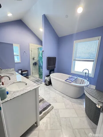 a view of a livingroom with furniture and a wooden floor