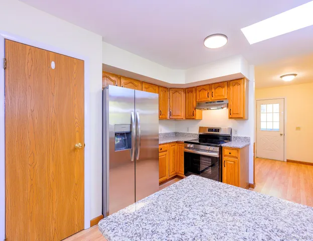 a large kitchen with a lot of counter space