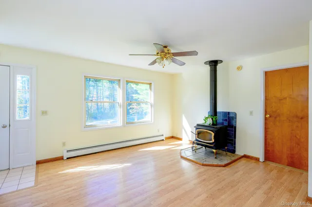 a view of workspace with furniture and window
