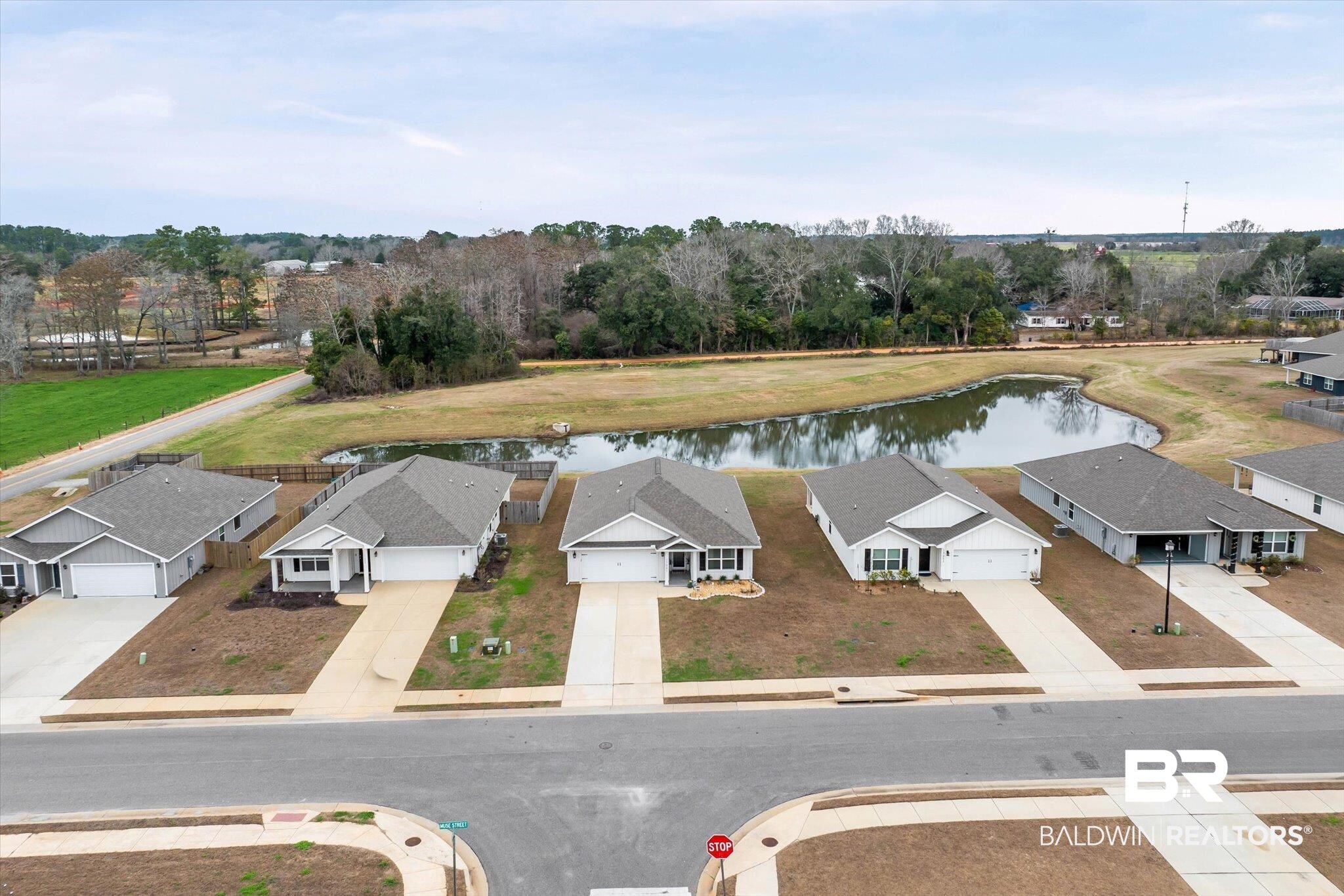17041 Muse Street Loxley, AL 36551 - Photo 34 of 44 Aerial view of residential area featuring a large body of water