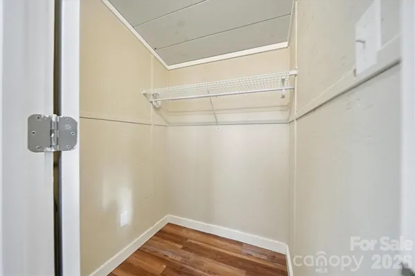 a view of small space with racks on the wall