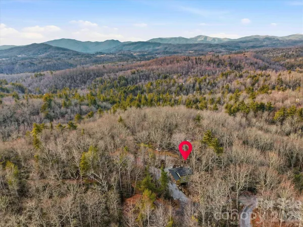 a view of mountains and valleys