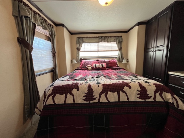 2795 East 28th Road Marseilles, IL 61341 - Photo 15 of 60 a bedroom with a bed next to a window