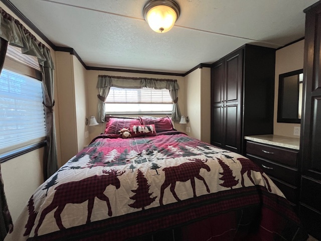 2795 East 28th Road Marseilles, IL 61341 - Photo 16 of 60 a bedroom with a bed and window