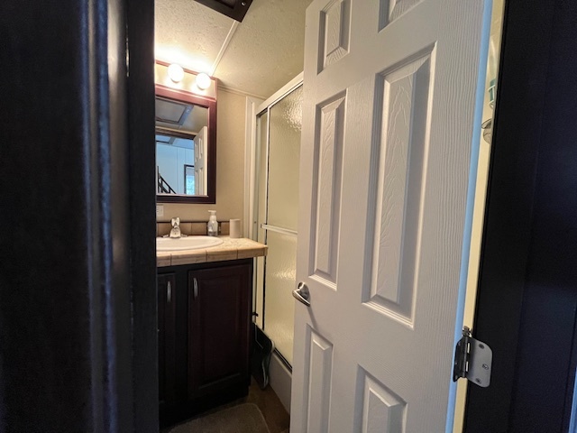 2795 East 28th Road Marseilles, IL 61341 - Photo 18 of 60 a bathroom with a sink and mirror
